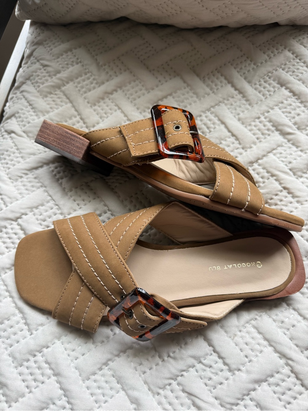 Chocolat Blu Tan Crossover Slide Mules with Tortoiseshell Buckles